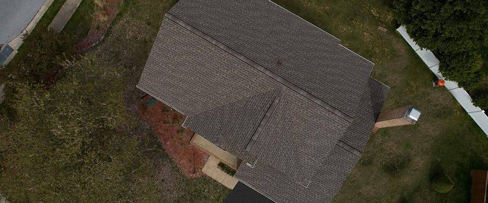 overhead view of replaced roof after storm damage