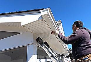 RoofPRO installing new gutters