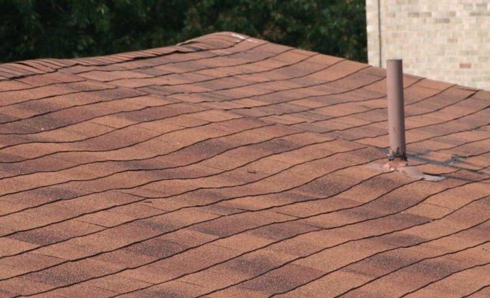 roof wavey from rotting that needs repairs